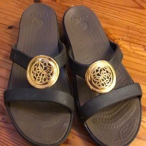 Crocs Sandals with Gold Emblem
